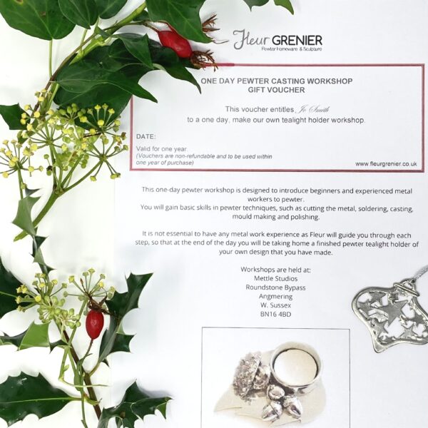 paper gift voucher christmas decoration and holly