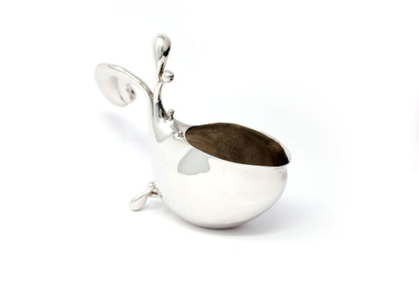 sculptural flowing shiny pewter jug