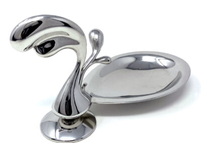 tear drop shape pewter silver colour small tray with decorative flowing stand at the side