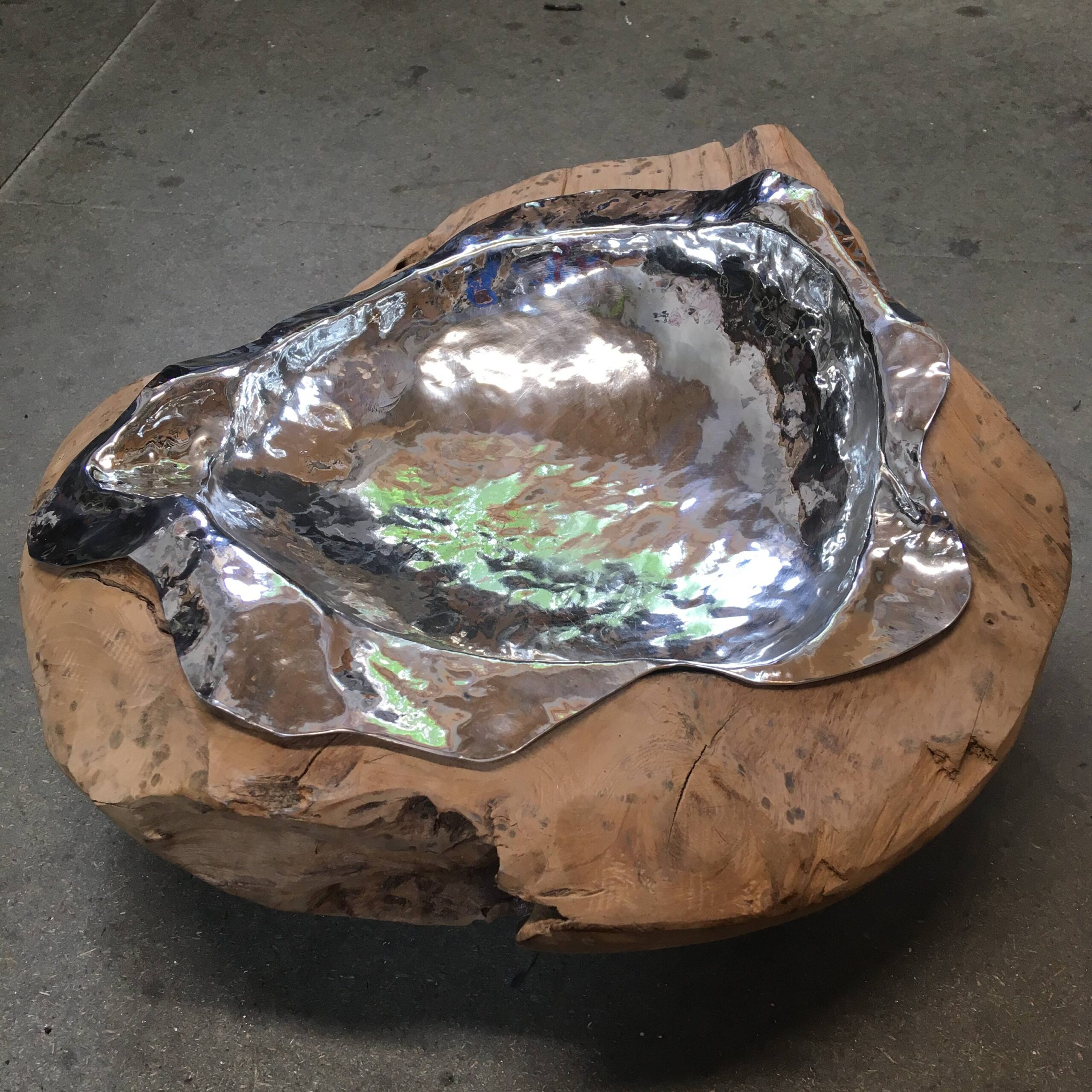 natural wooden pewter shape with pewter sheet hammered into it to create a linining 1 to 1 workshop