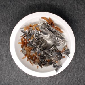 ivy and fern botanicals cast into a pewter bowl