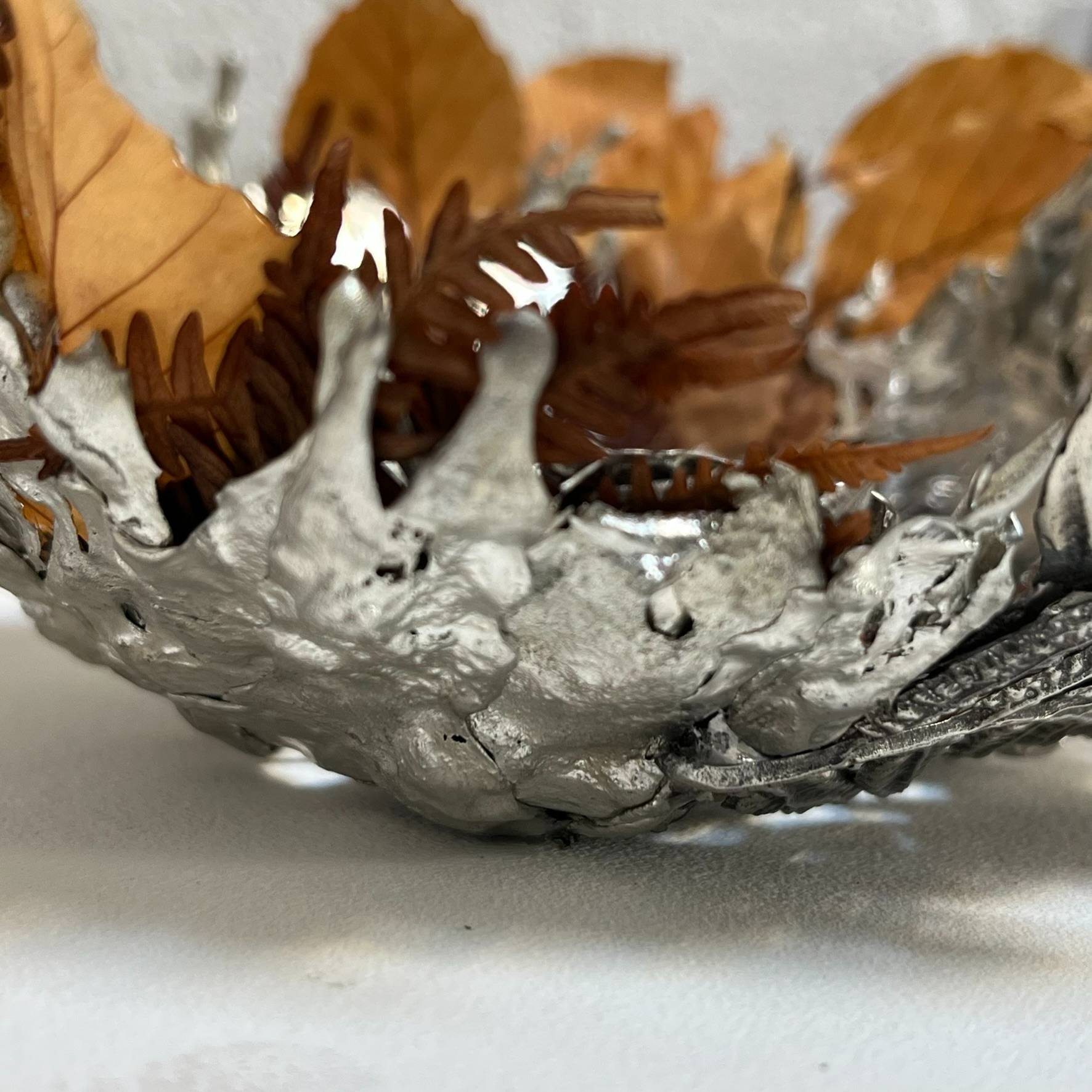 detail of the back of the pewter sculpture